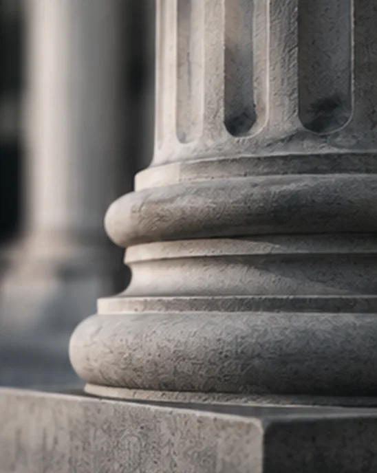 Illustrative study of traditional stone columns; not the firm’s office
